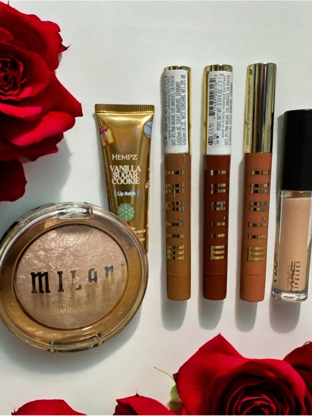 Milani Highlighter/Face Powder + Hempz Vanilla Lip Balm + MAC & NYX Lip Gloss